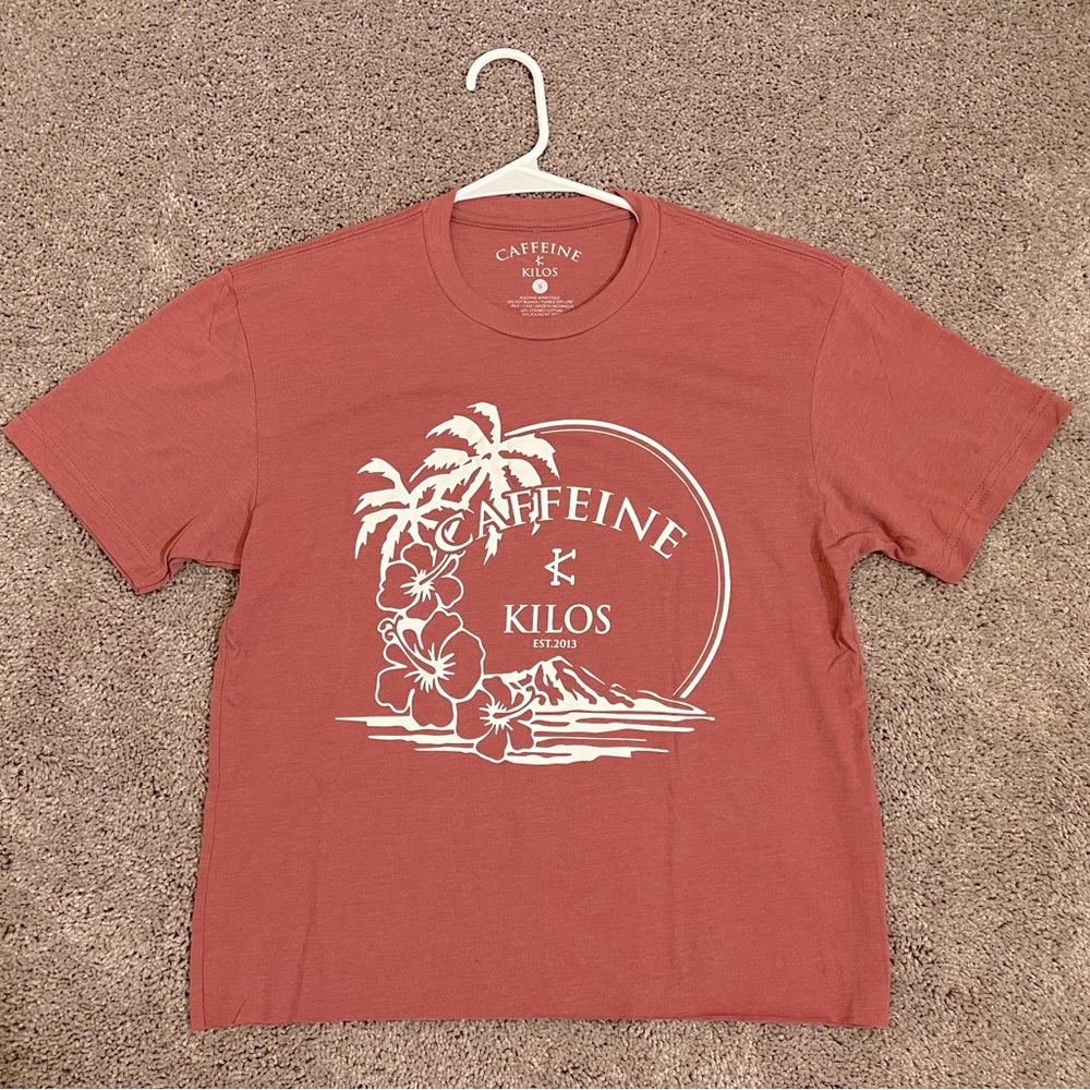 Brand New Caffeine and Kilos “Modest Crop” Tee!
Size Small